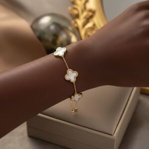 Elegant Gold and White Clover Bracelet